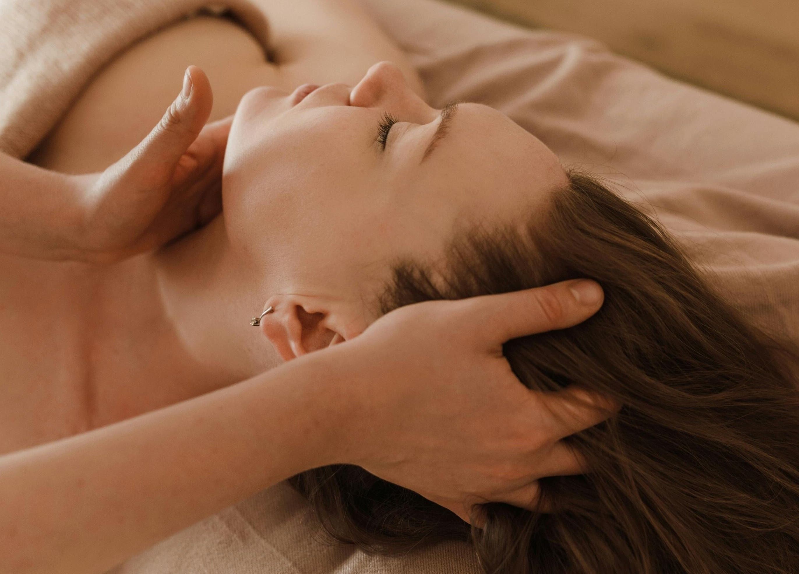 Relaxing head massage at Root and Remedy Wellness in Purleigh, England, GB.