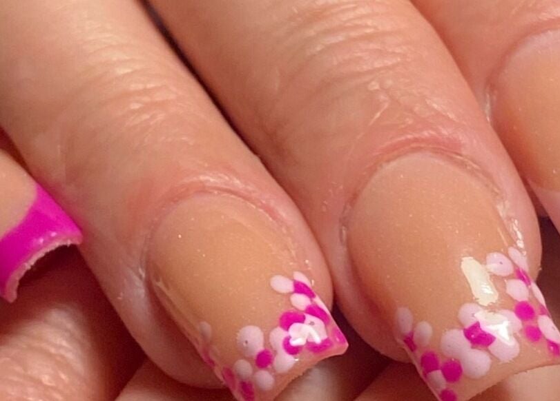 Floral pink nail art at Nina’s Nail Studio, Dublin, County Dublin, IE offering elegant manicures.