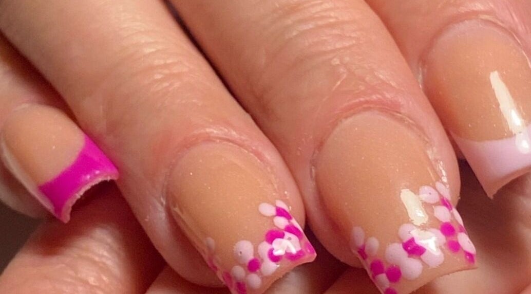 Floral pink nail art at Nina’s Nail Studio, Dublin, County Dublin, IE offering elegant manicures.