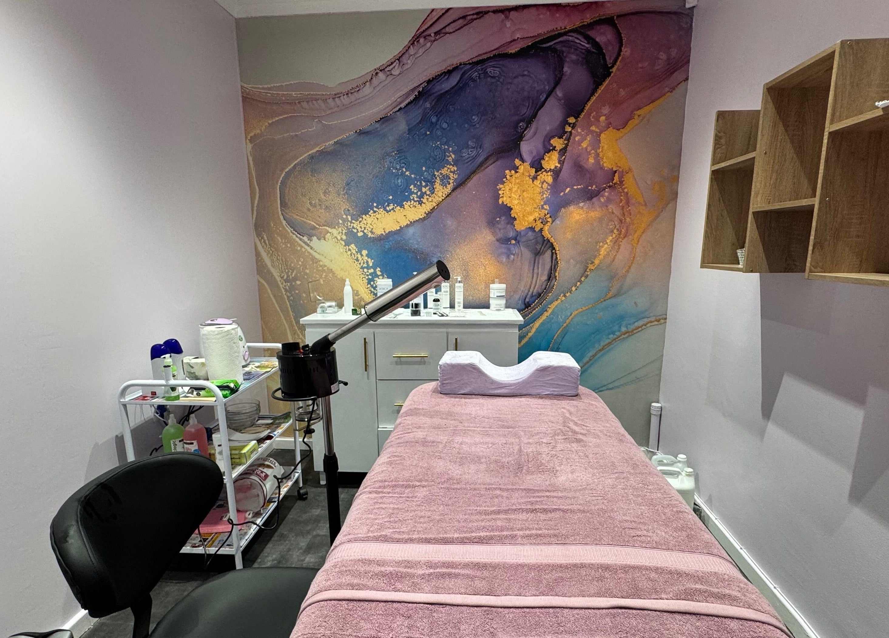 Relaxing treatment room at Blush and Buff, Cape Town, Western Cape, ZA with calming decor and spa bed.