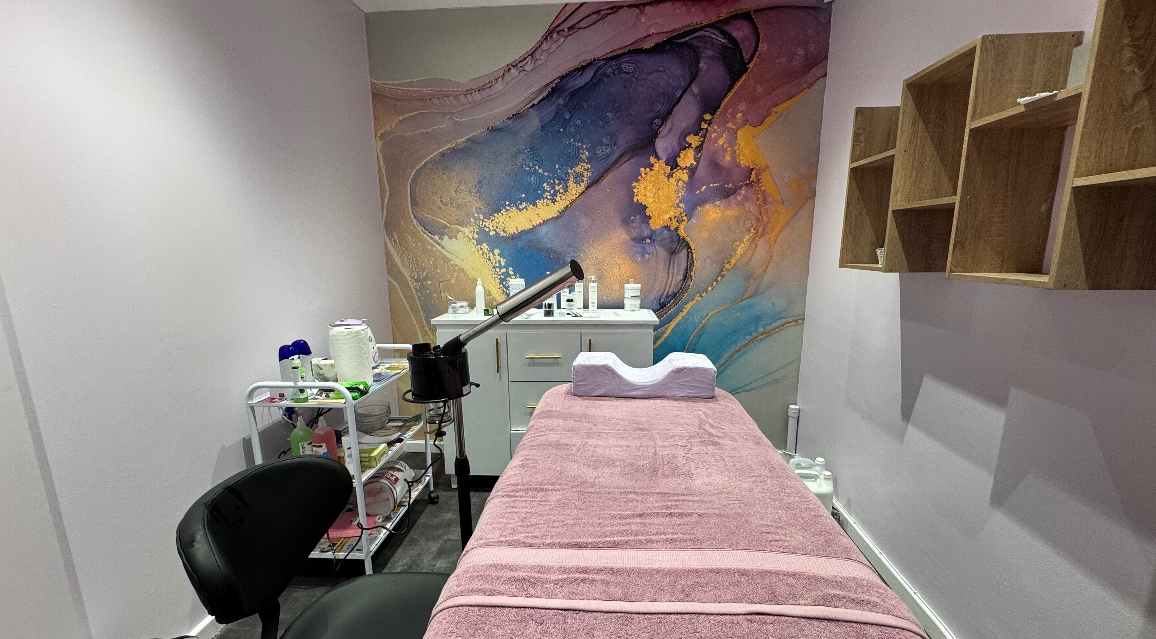 Relaxing treatment room at Blush and Buff, Cape Town, Western Cape, ZA with calming decor and spa bed.