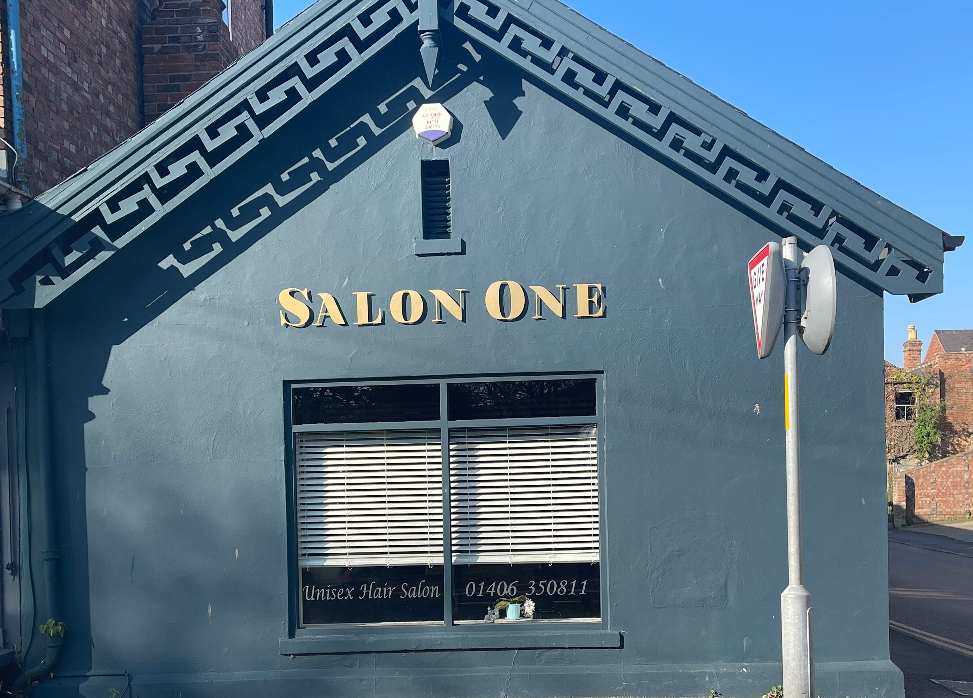 Elegant facade of AS Skin Clinic at Sutton Bridge, England, GB, showcasing stylish salon design.