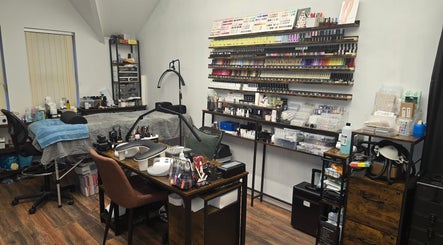 Kalos & Grace beauty studio in Ballymoney, Northern Ireland, featuring a colorful nail polish display and workspace.