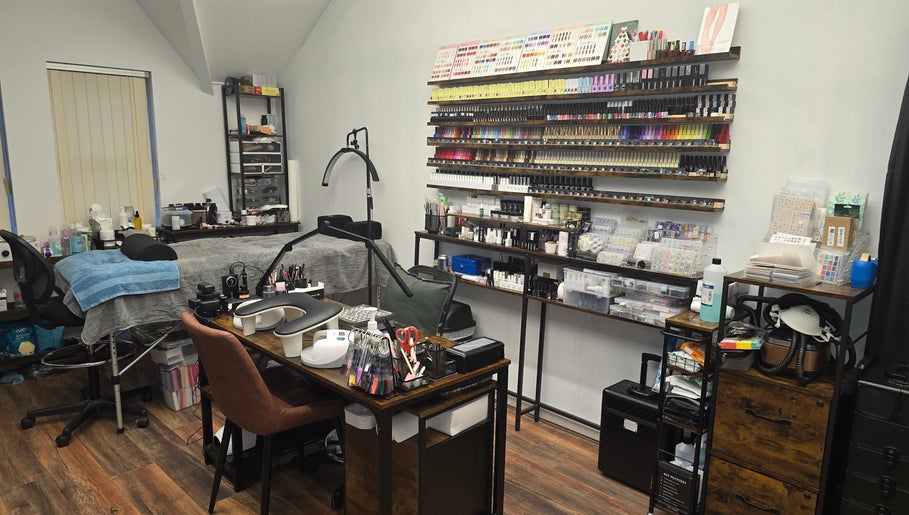 Nail and beauty studio station at Kalos & Grace, Ballymoney, Northern Ireland, GB showcasing organized nail polish.