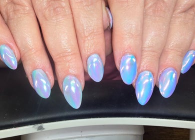 Iridescent nails at Kalos & Grace, Ballymoney, Northern Ireland, GB, showcasing elegant nail art.