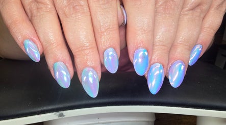 Iridescent nails at Kalos & Grace, Ballymoney, Northern Ireland, GB, showcasing elegant nail art.