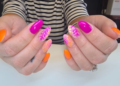 Colorful nail art at Kalos & Grace, Ballymoney, Northern Ireland, GB showcasing vibrant designs.