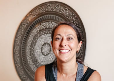 Smiling practitioner at Balance And Bloom Ayurveda, Higher Ground, Brighton And Hove, England, GB.