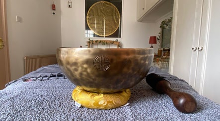 A singing bowl on a table at Balance And Bloom Ayurveda - Home Studio (Invite Only), Brighton And Hove, England, GB.