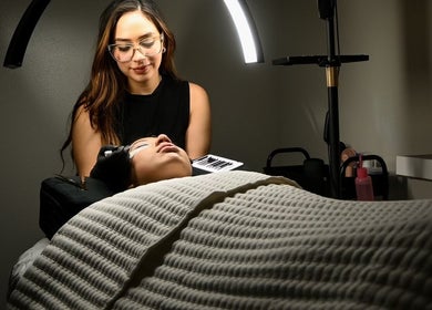 Aesthetician performing beauty treatment at Daniela Duran Studio, Metairie, Louisiana, US.