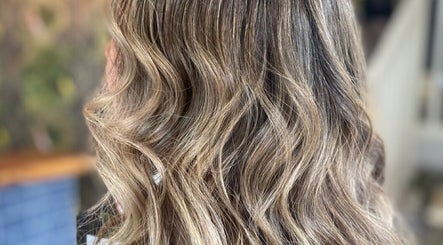 Elegant wavy hairstyle at Einna Harris Hair, Burswood, Western Australia, AU. Perfect for a timeless look.