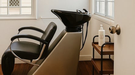 Sleek salon wash station at Hair with Gretta, Caloundra, Queensland, AU. Modern and inviting interior.