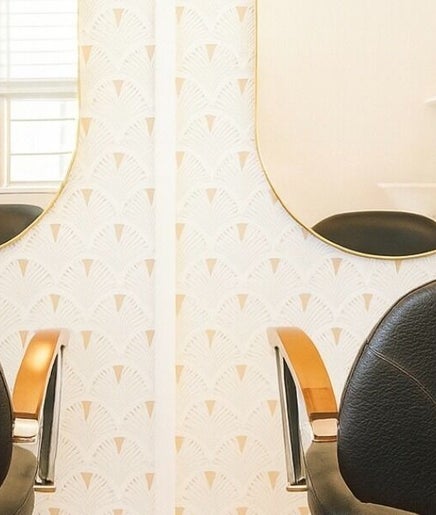 Elegant salon chairs at Hair with Gretta, Caloundra, Queensland, AU create a relaxing atmosphere.