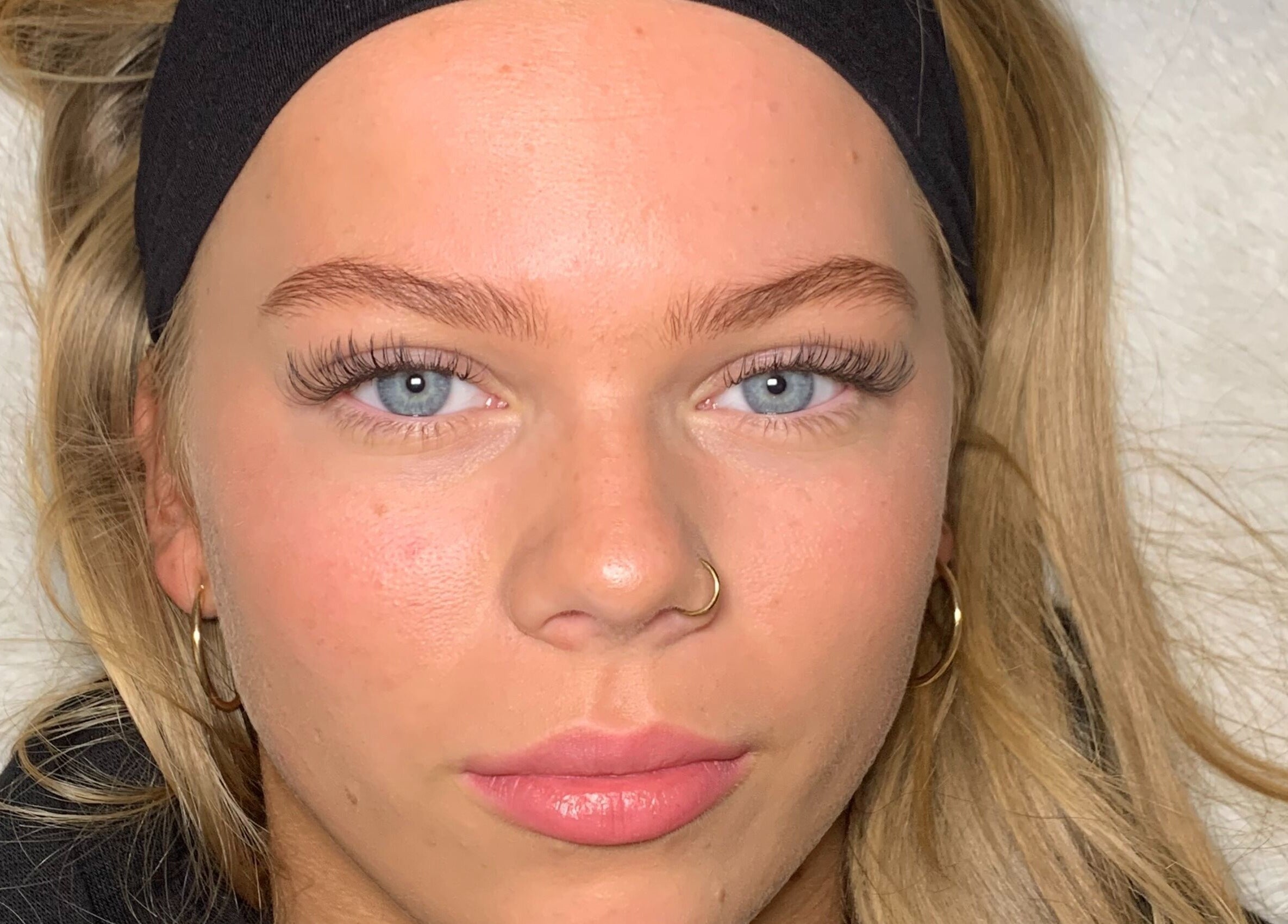 Close-up of client with enhanced eyelashes at Modify Beauty Bar in Melbourne, Victoria, AU.