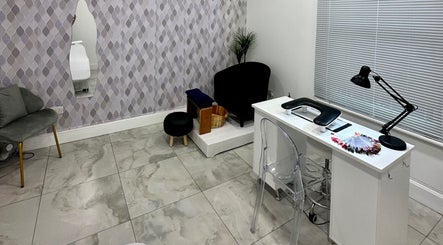 Chic nail studio setup at Suav Nails Beauty, Enfield, England, GB, featuring a modern manicure station.