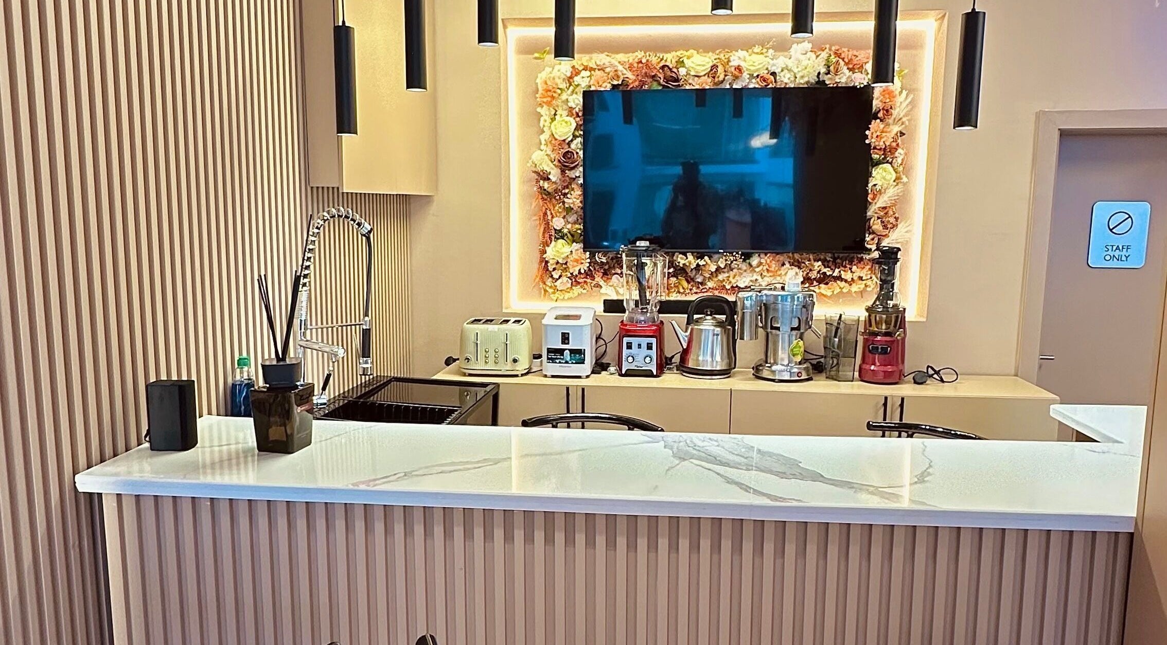 Modern kitchenette with appliances at Elevoire Beauty Lounge, Abuja, Federal Capital Territory, NG.