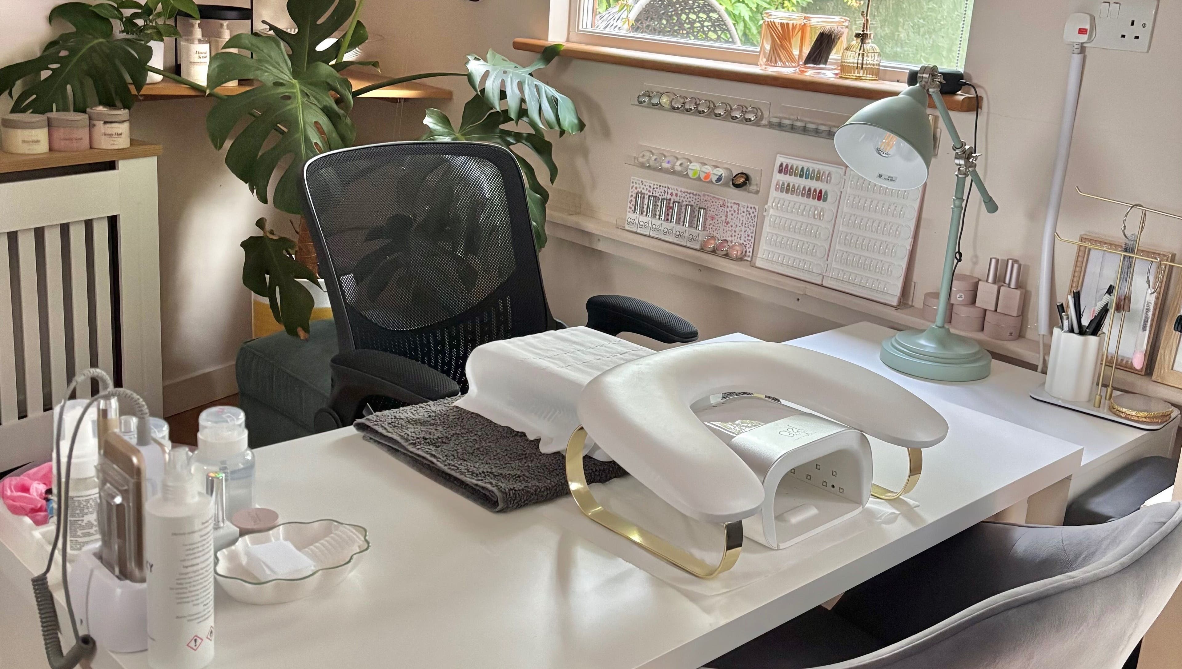 Elegant nail station at Bebe Nails, New Malden, England, GB, featuring modern decor and manicure tools.