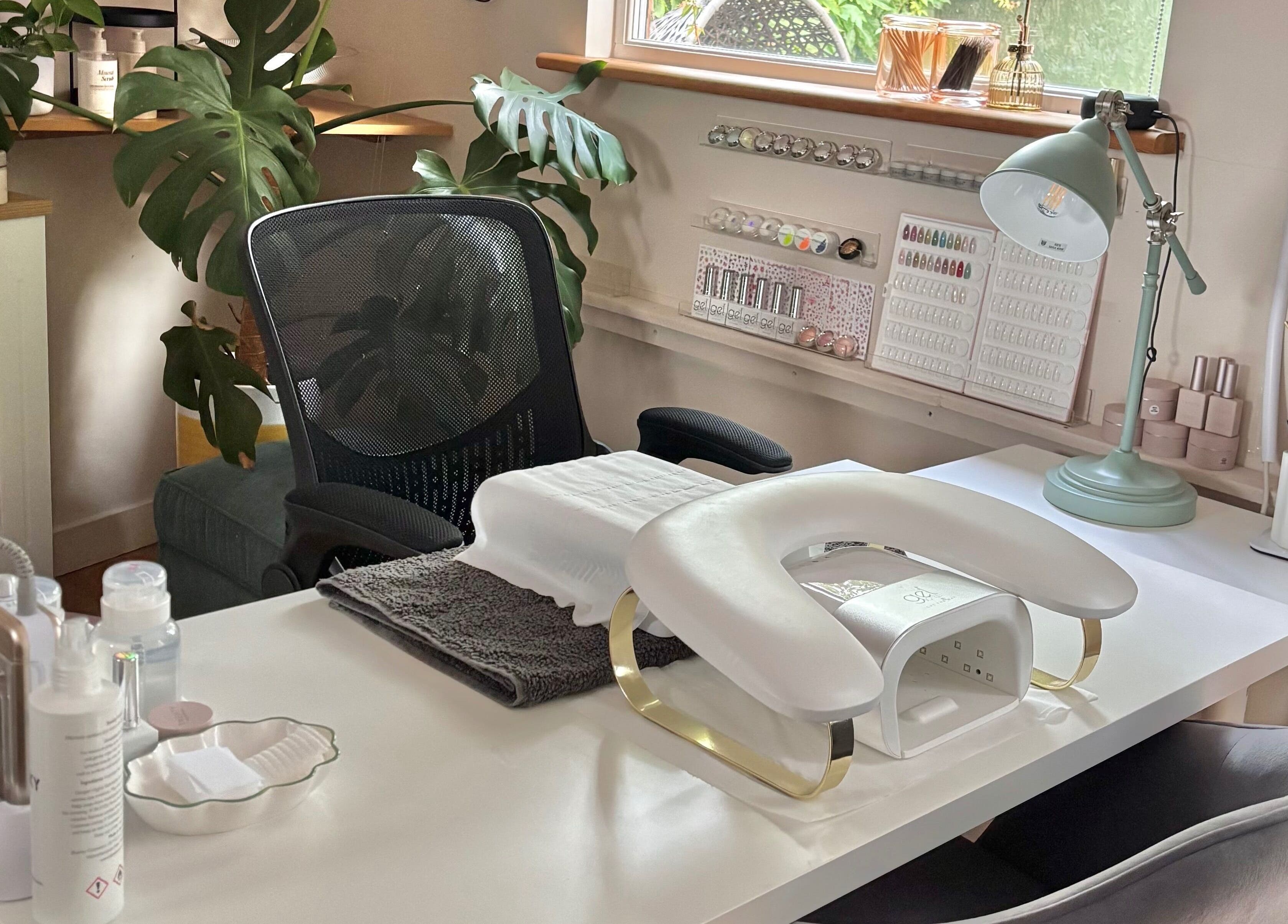 Elegant nail station at Bebe Nails, New Malden, England, GB, featuring modern decor and manicure tools.