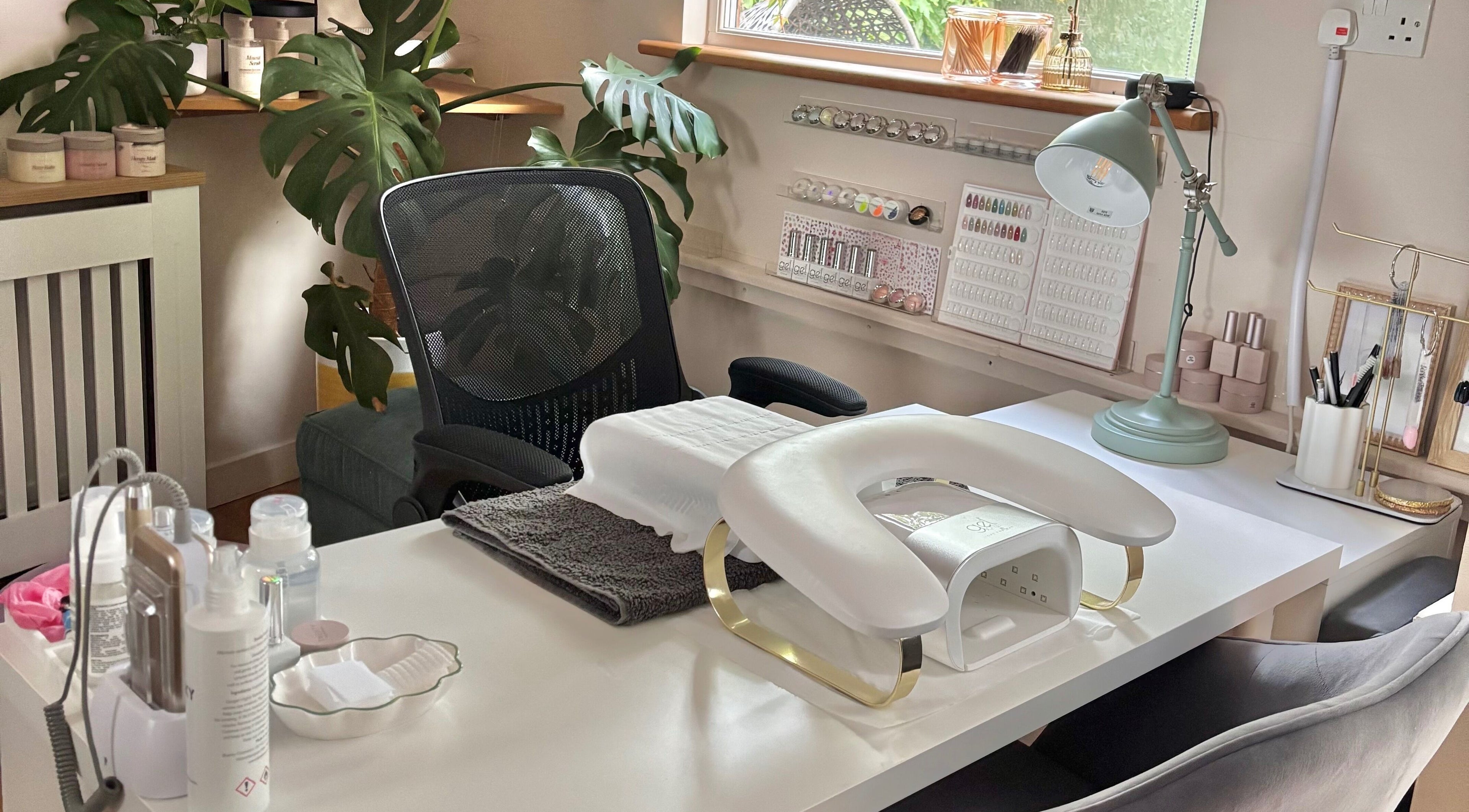 Elegant nail station at Bebe Nails, New Malden, England, GB, featuring modern decor and manicure tools.