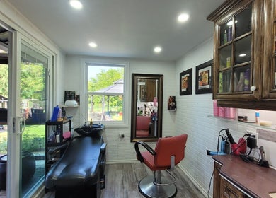 Cozy salon interior at Jane hairstylist in Hamilton, Ontario, CA with a stylist chair and modern decor.