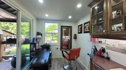 Cozy salon interior at Jane hairstylist in Hamilton, Ontario, CA with a stylist chair and modern decor.