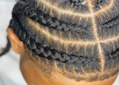Intricate braided hairstyle at Chineeys Hairempire, San Fernando, San Fernando City Corporation, TT.