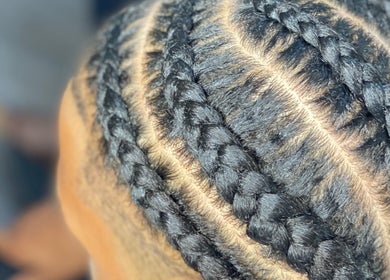 Intricate braided hairstyle at Chineeys Hairempire, San Fernando, San Fernando City Corporation, TT.