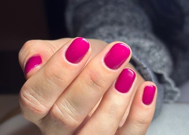 Vibrant pink manicure at Mano Mona Nails, Bondi Beach, New South Wales, AU. Showcasing expert nail artistry.