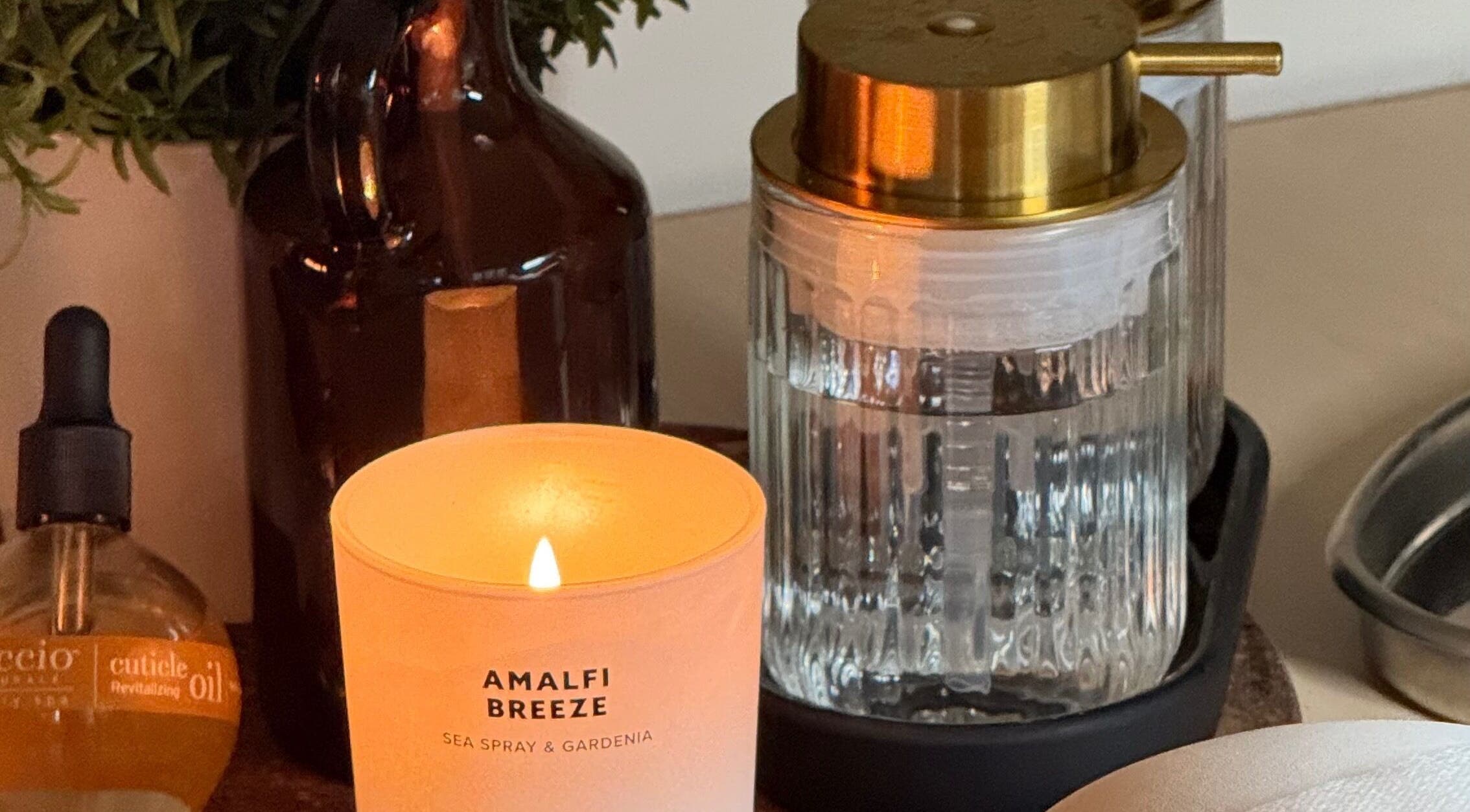 Amalfi Breeze candle and oils at Mano Mona Nails, Bondi Beach, New South Wales, AU enhance a calming ambiance.
