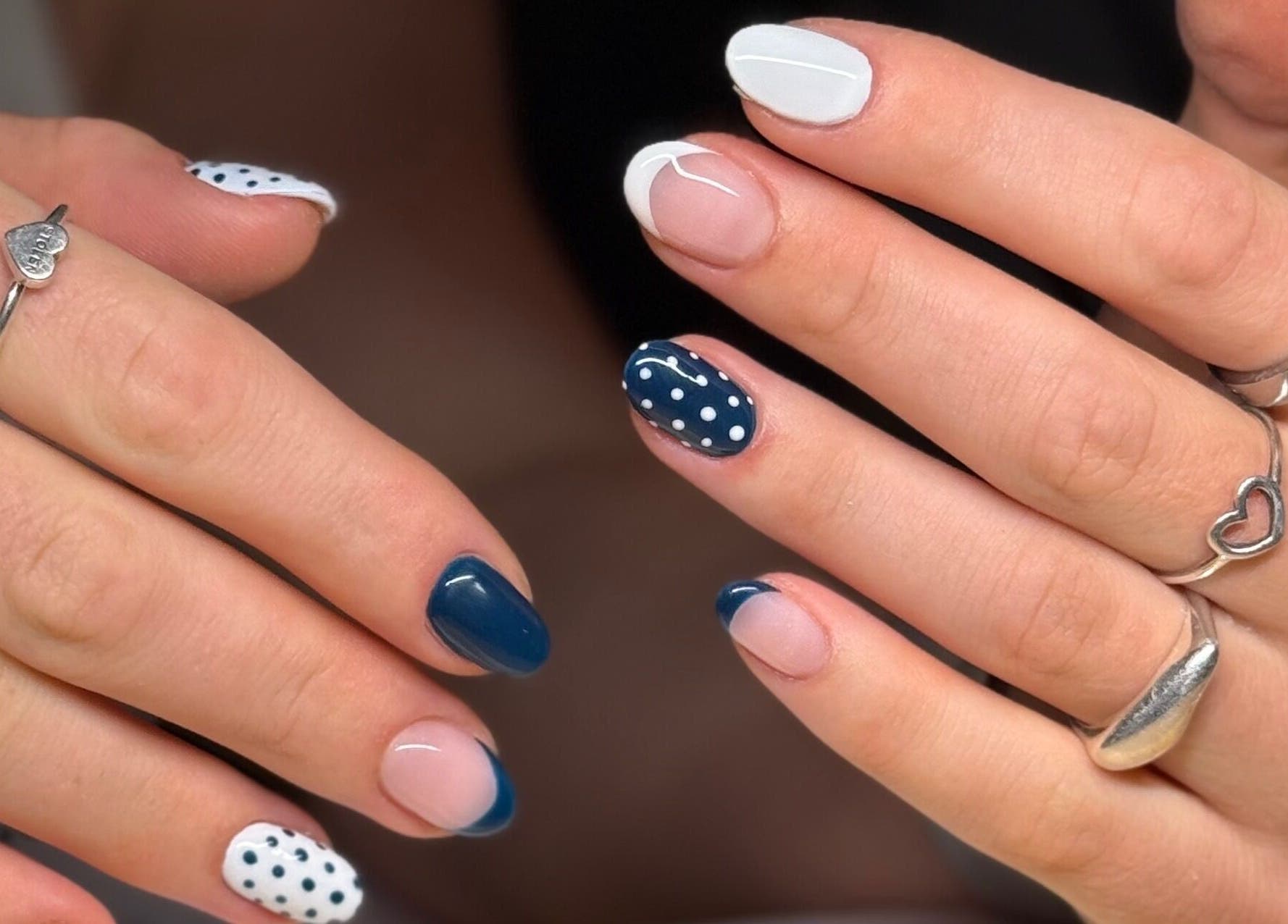Elegant blue and white nail art at Mano Mona Nails, Bondi Beach, New South Wales, AU, featuring polka dots.