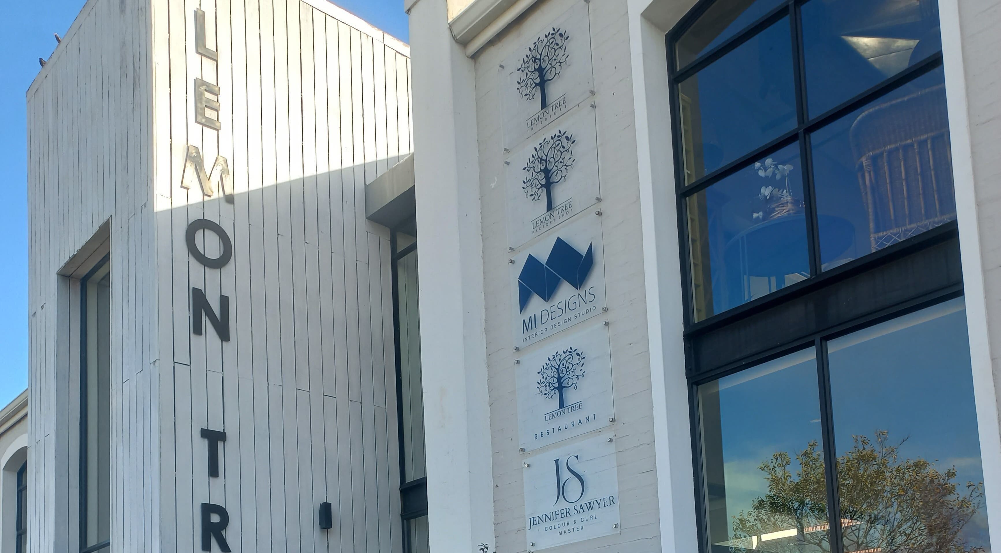 Exterior view of a modern building hosting Barber On Wheels at Gqeberha, Eastern Cape, ZA.