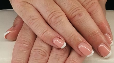 Elegant French manicure at EverLuxe Nails, Bilston, Scotland, GB showcasing expert nail artistry.