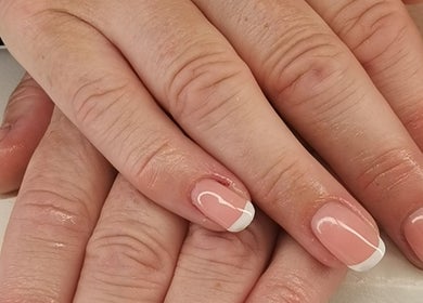 Elegant French manicure at Ever Luxe Nails, Bilston, Scotland, GB. Perfectly polished nails with white tips.