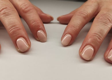 Elegant nude manicure at Ever Luxe Nails, Bilston, Scotland, GB. Perfectly polished finish.