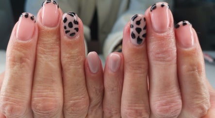 Stylish cheetah print nail art at Ever Luxe Nails, Bilston, Scotland, GB. Perfect for a trendy look.