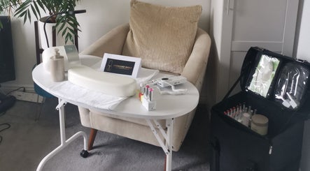 Cozy nail setup at Ever Luxe Nails, Bilston, Scotland, GB, featuring manicure tools and plush seating.
