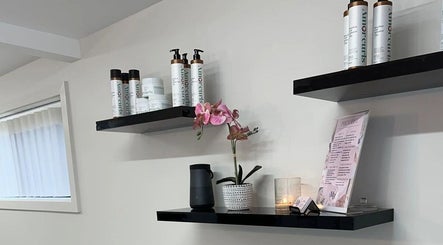 Elegant product display at Studio MB Hair, Cowra, New South Wales, AU, showcasing stylish decor and hair products.
