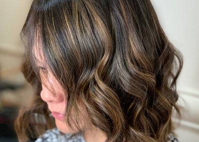 Glossy brown hair with soft waves styled at Studio MB Hair, Cowra, New South Wales, AU.