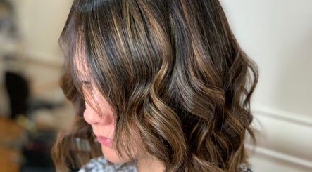 Glossy brown hair with soft waves styled at Studio MB Hair, Cowra, New South Wales, AU.