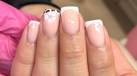 Elegant floral French manicure at Glossy Nails, Pontypridd, Wales, GB.