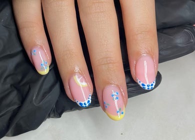 Stylish nail art featuring vibrant designs at Glossy Nails, Pontypridd, Wales, GB.