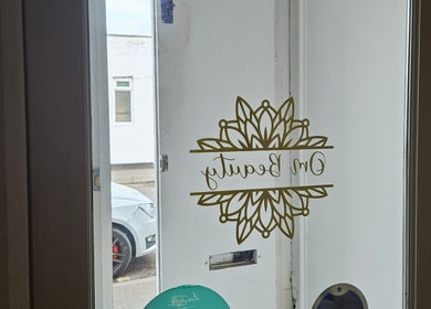 Front door with floral design at Elara Holistic Therapies, Rutherglen, Scotland, GB.