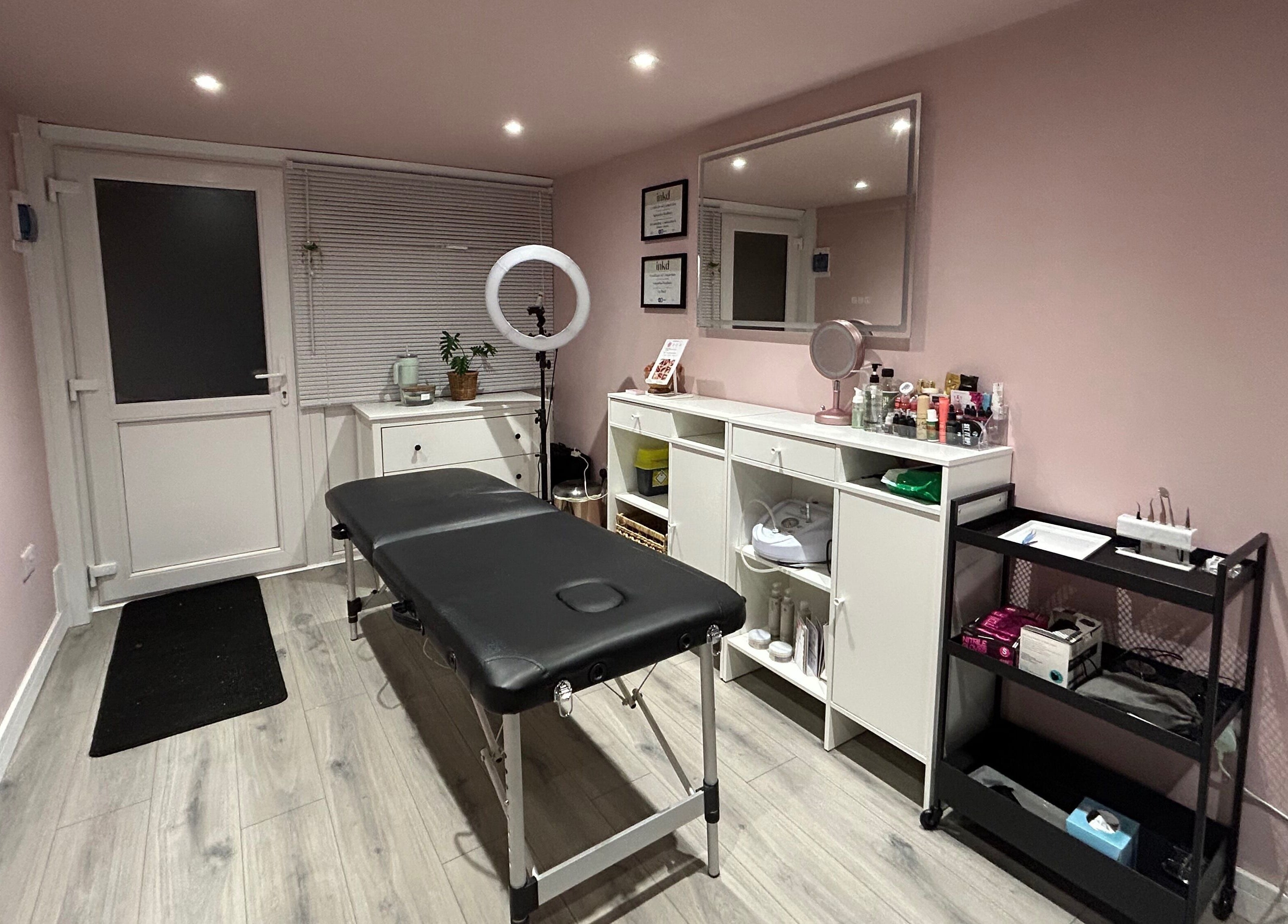 A serene treatment room at Be Defined Beauty, Billinge, England, GB showcasing modern decor and wellness setup.
