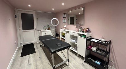 A serene treatment room at Be Defined Beauty, Billinge, England, GB showcasing modern decor and wellness setup.