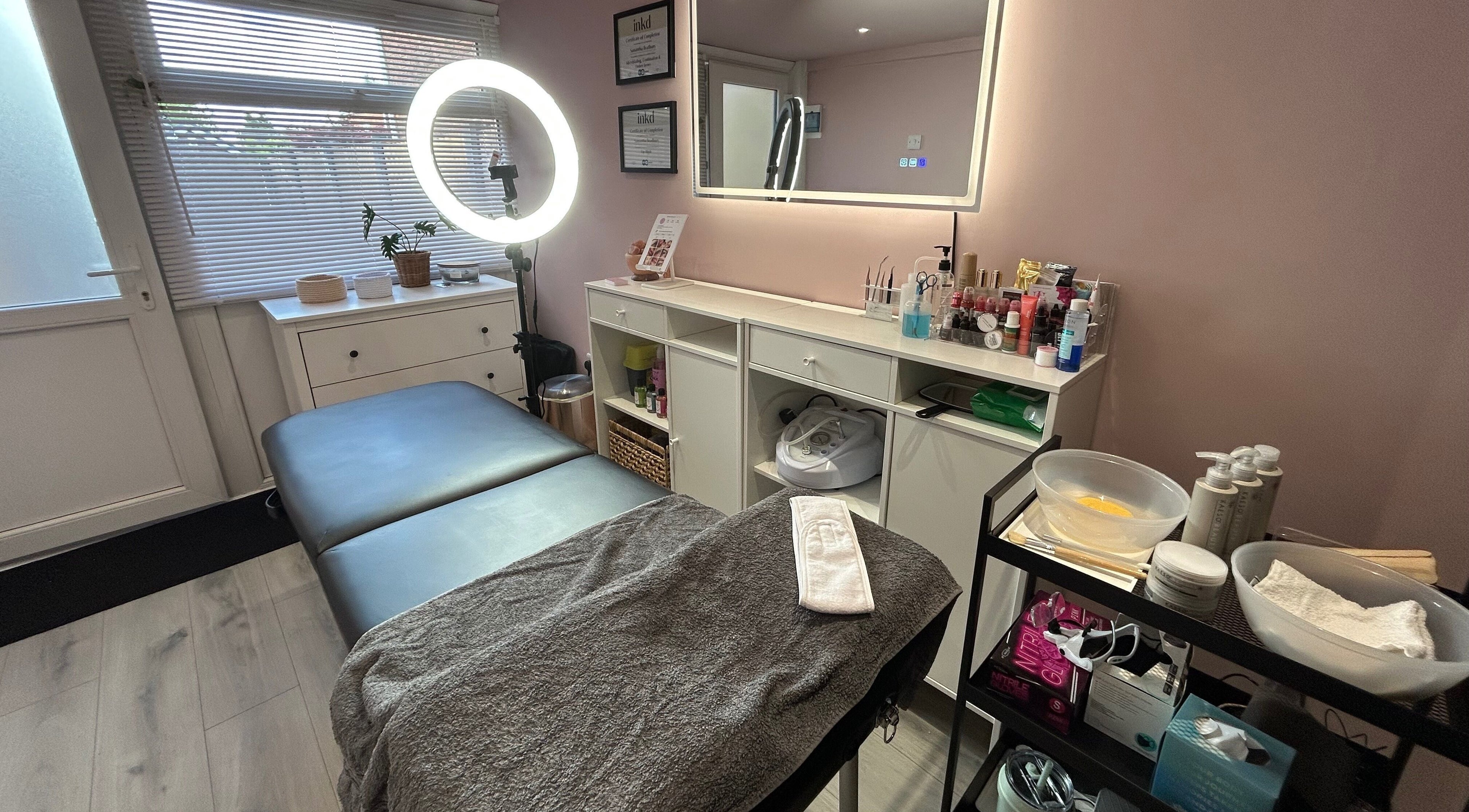 Luxurious treatment room at Be Defined Beauty, Billinge, England, GB, showcasing a modern and relaxing setup.