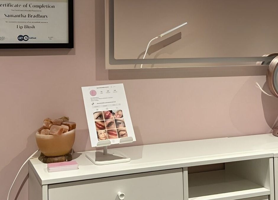 Beauty station at Be Defined Beauty, Billinge, England, GB with mirror and skincare products.