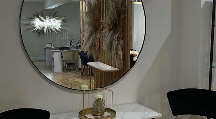Chic interior of Extendedbyg in Doncaster, England, GB with a stylish round mirror and elegant decor.