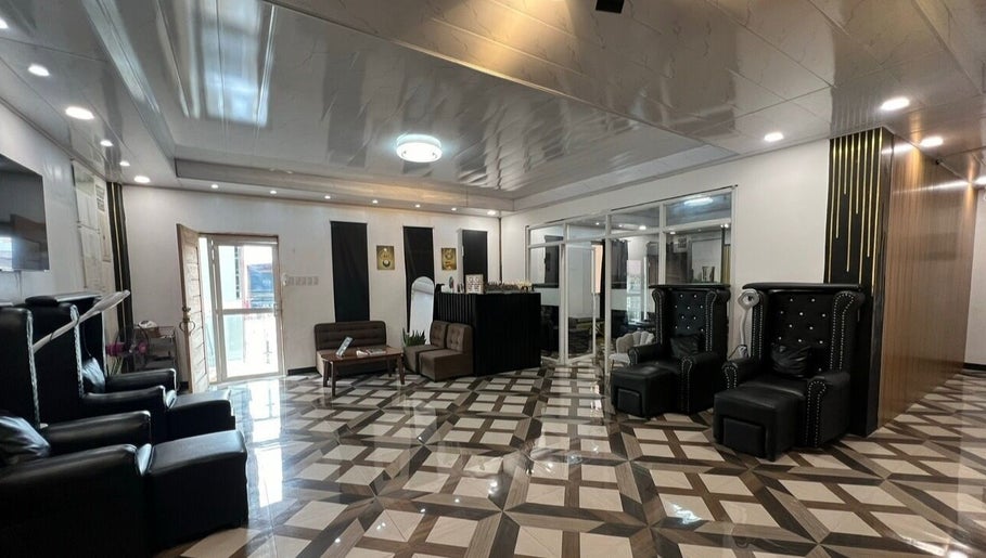 Elegant interior of DC Beauty Lounge in Mangatarem, Ilocos Region, PH featuring modern design and plush seating.