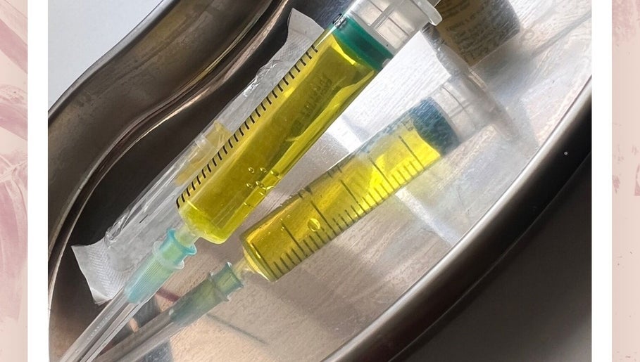 Yellow syringes at Glowaestheticbyjaz, London, England, GB highlighting professional beauty treatments.