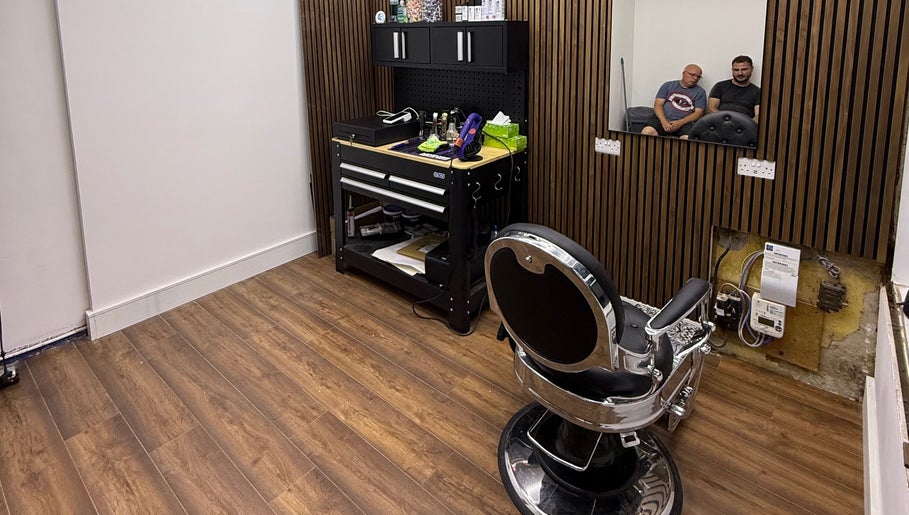 Modern barber station at Stokes Cuts, Broadstairs, England, GB, featuring sleek chair and stylish décor.